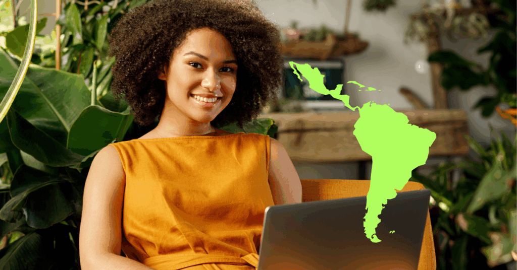 Latin American developer working from home with map of the region representing nearshoring.
