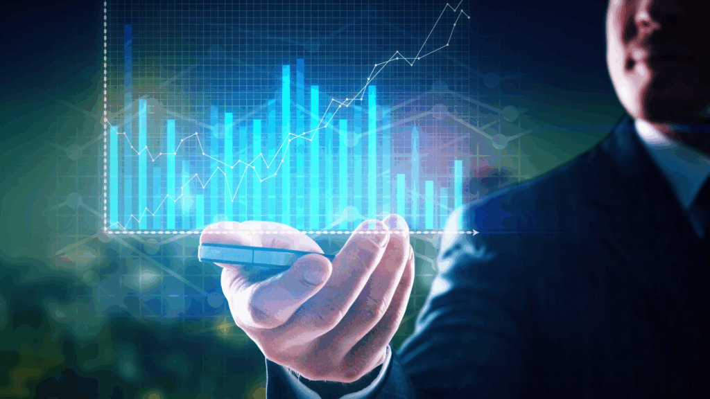 Businessman presenting a holographic bar and line chart, symbolizing the integration of data analytics and custom software in fintech innovations.