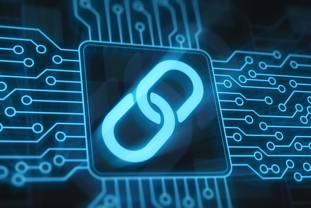 parallelstaff- A glowing digital chain link icon sits at the center of a circuit board background, symbolizing digital connectivity and blockchain—perfect imagery for those looking to find blockchain developers, with blue circuitry patterns extending outward.