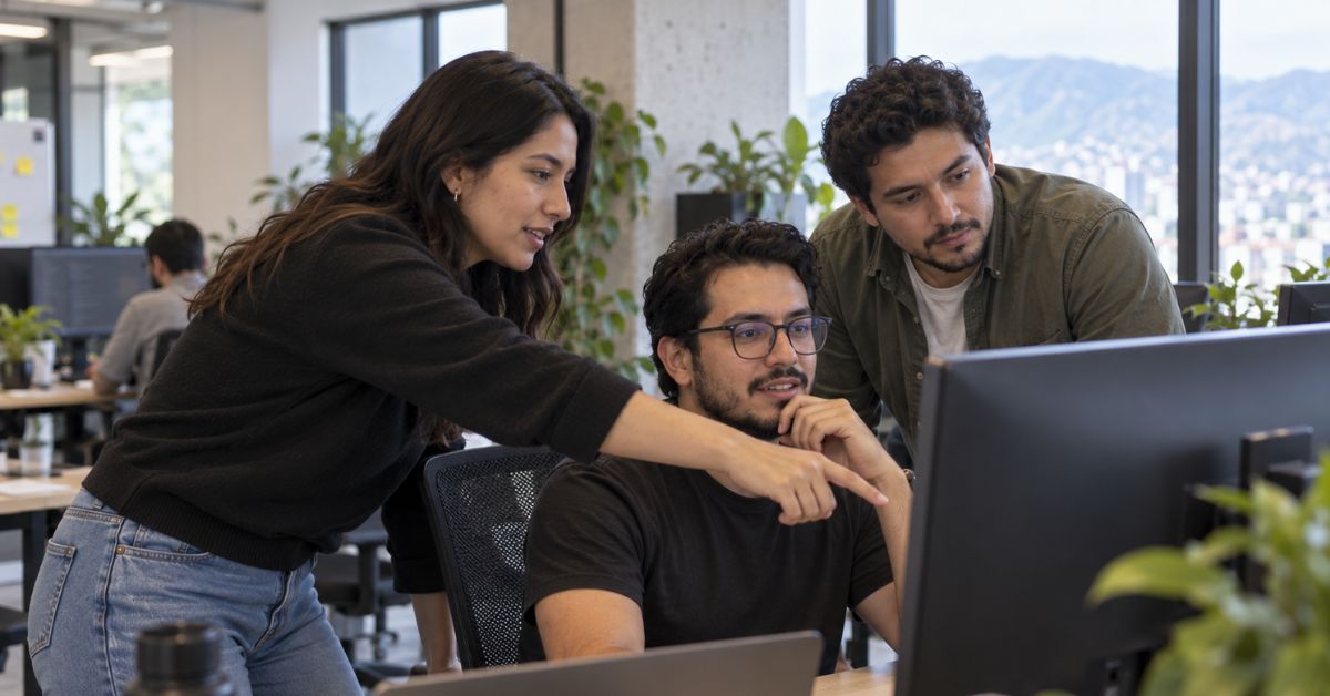 Nearshore software engineering team reviewing a development project